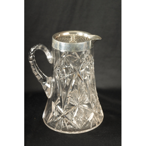 668 - AN EARLY 20TH CENTURY CUT GLASS AND SILVER MOUNTED LEMONADE JUG of tapering form with twist off pier... 