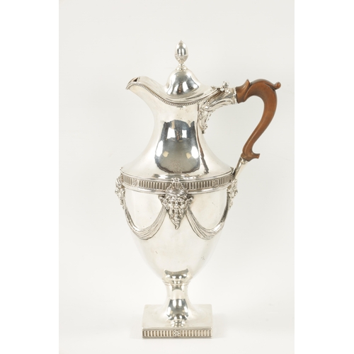 672 - A STYLISH GEORGE III SILVER WINE EWER of crested pedestal form in the classical 'Adam' design with a... 