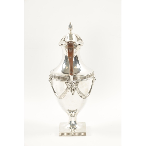 672 - A STYLISH GEORGE III SILVER WINE EWER of crested pedestal form in the classical 'Adam' design with a... 