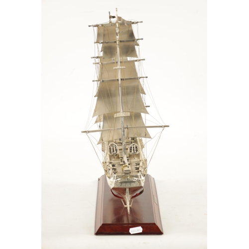 673 - A 20TH CENTURY SILVER MODEL OF THE FAMOUS HMS BOUNTY SHIP the three masted sailing ship with sails a... 