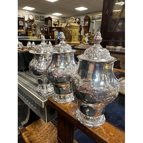 686 - A GOOD GEORGE III SHAGREEN CASED SET OF THREE OLD SHEFFIELD TEA CADDIES the double ogee hinged lid w... 