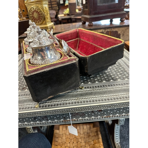 686 - A GOOD GEORGE III SHAGREEN CASED SET OF THREE OLD SHEFFIELD TEA CADDIES the double ogee hinged lid w... 