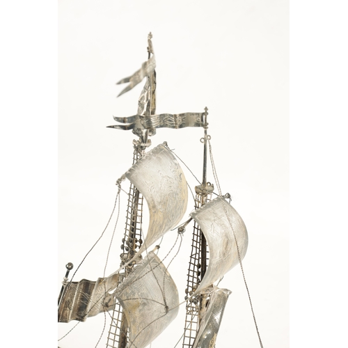 697 - A LATE 19TH CENTURY CONTINENTAL SILVER NEFF WITH ENGLISH IMPORT MARKS the silver two-masted ship wit... 