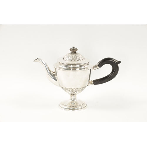 700 - AN EARLY 19TH CENTURY CONTINENTAL SILVER TEAPOT - POSSIBLY BALTIC of plain and leaf cast design with... 