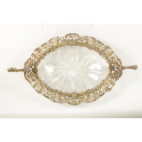 705 - AN EARLY 20TH CENTURY GILT CAST SILVER TWO-HANDLED SHALLOW DISH engraved glass centre, with frog and... 