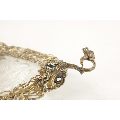 705 - AN EARLY 20TH CENTURY GILT CAST SILVER TWO-HANDLED SHALLOW DISH engraved glass centre, with frog and... 