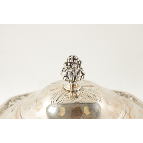 706 - A 19TH CENTURY CONTINENTAL SILVER TWO-HANDLED LIDDED VEGETABLE DISH of squat bulbous, form the rim h... 