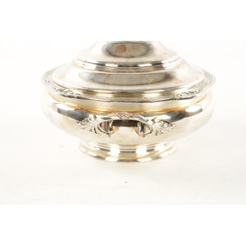 706 - A 19TH CENTURY CONTINENTAL SILVER TWO-HANDLED LIDDED VEGETABLE DISH of squat bulbous, form the rim h... 