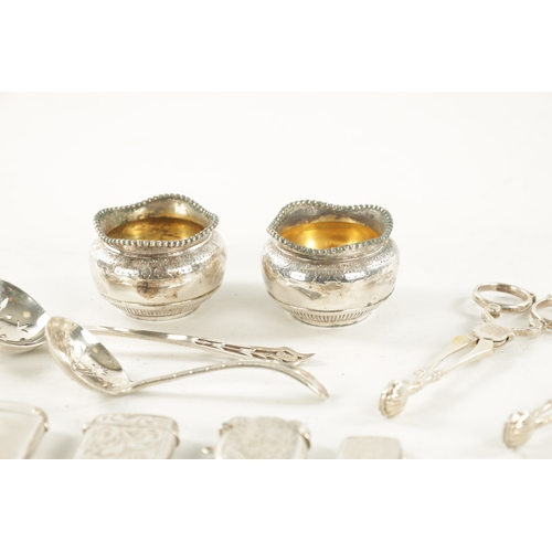 708 - A SELECTION OF MISCELLANEOUS SILVER comprising of a baby rattle, three vestas, three pairs of sugar ... 