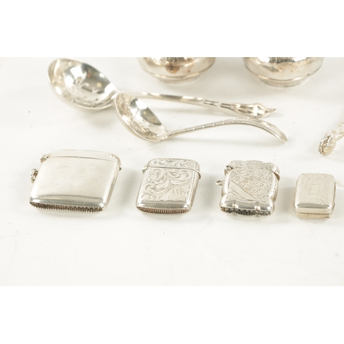 708 - A SELECTION OF MISCELLANEOUS SILVER comprising of a baby rattle, three vestas, three pairs of sugar ... 