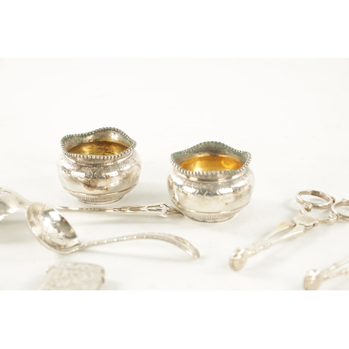 708 - A SELECTION OF MISCELLANEOUS SILVER comprising of a baby rattle, three vestas, three pairs of sugar ... 