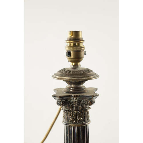 711 - A 19TH CENTURY SILVER PLATED CORINTHIAN COLUMN TABLE LAMP (57cm high )