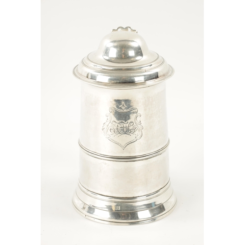 712 - A GEORGE III SILVER TANKARD of plain monogrammed tapering footed form with ribbed girdle, dome cover... 