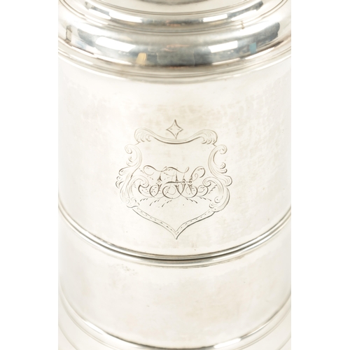 712 - A GEORGE III SILVER TANKARD of plain monogrammed tapering footed form with ribbed girdle, dome cover... 