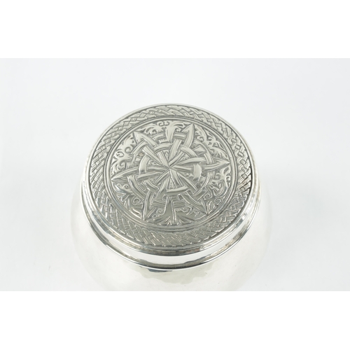 713 - A LIBERTY & CO. ARTS AND CRAFTS SILVER LIDDED BOX DESIGNED BY BERNARD CUZNER the cauldron shaped box... 