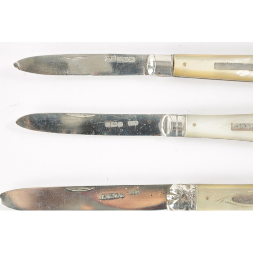 722 - A COLLECTION OF FOUR 19TH CENTURY SILVER FOLDING POCKET FRUIT KNIVES with mother-of-pearl handles.