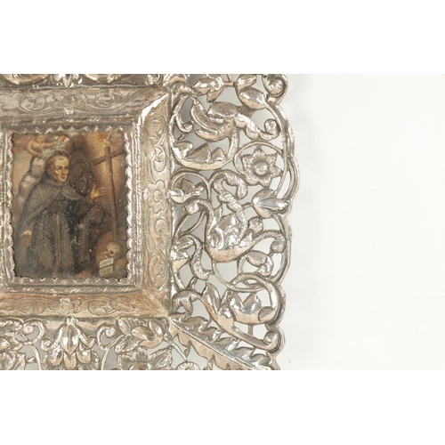 726 - AN EARLY 18TH CENTURY SOUTH AMERICAN SILVER FRAME of pierced embossed design with foliage and grotes... 