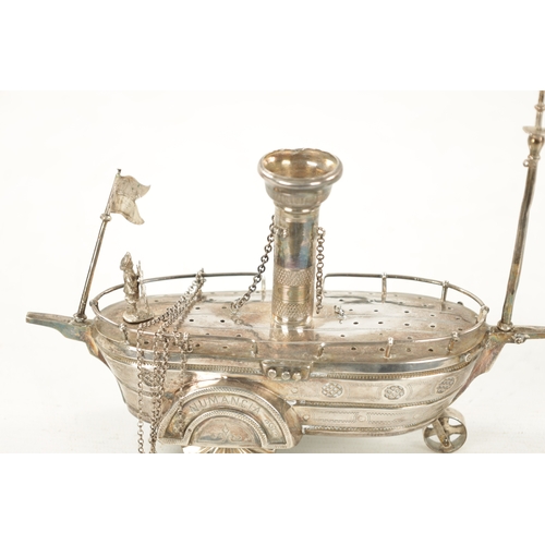 727 - AN EARLY 20TH CENTURY SILVER METAL NOVELTY TABLE LIGHTER modelled as a steam paddle boat inscribed '... 