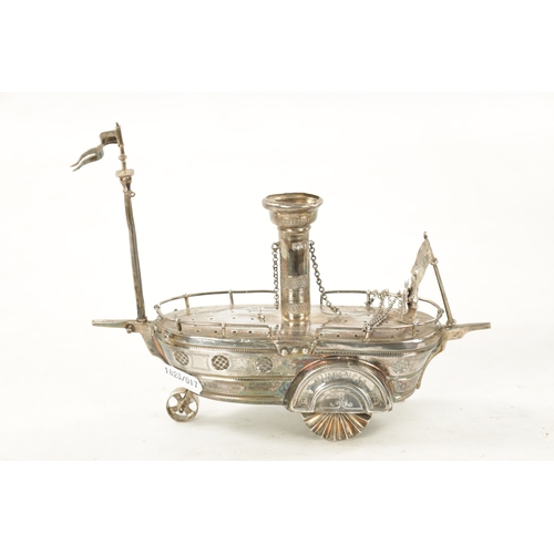 727 - AN EARLY 20TH CENTURY SILVER METAL NOVELTY TABLE LIGHTER modelled as a steam paddle boat inscribed '... 