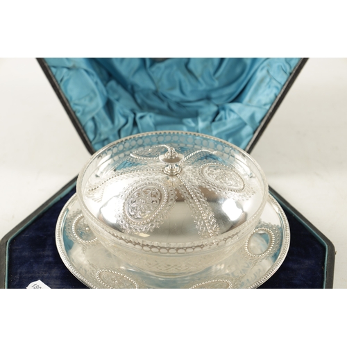 730 - A VICTORIAN SILVER BUTTER DISH IN FITTED LEATHER CASE with finely engraved segmented roundel and bea... 