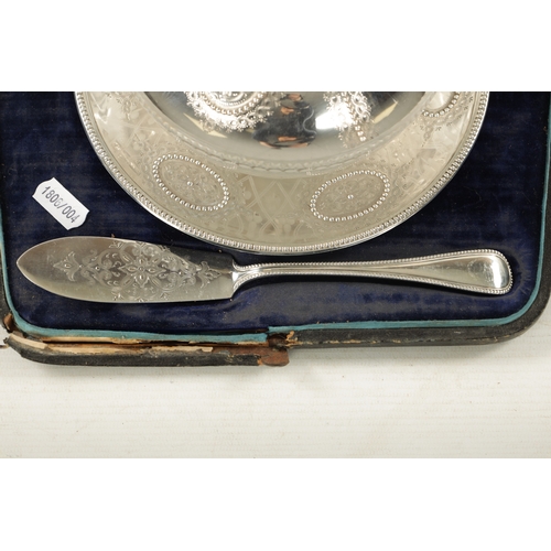 730 - A VICTORIAN SILVER BUTTER DISH IN FITTED LEATHER CASE with finely engraved segmented roundel and bea... 