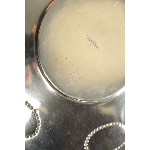 730 - A VICTORIAN SILVER BUTTER DISH IN FITTED LEATHER CASE with finely engraved segmented roundel and bea... 