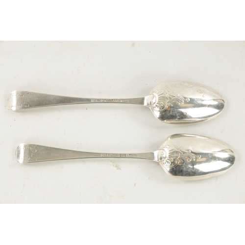 738 - A PAIR OF GEORGE III SILVER SCROLLED SHELLED BACK TABLESPOONS inscribed with initials and dated 1769... 