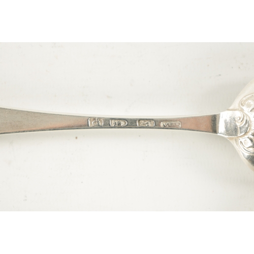 738 - A PAIR OF GEORGE III SILVER SCROLLED SHELLED BACK TABLESPOONS inscribed with initials and dated 1769... 