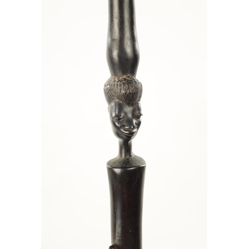 742 - A 19TH CENTURY AFRICAN HARDWOOD WALKING STICK with carved bust and snake, together with A 19TH CENTU... 