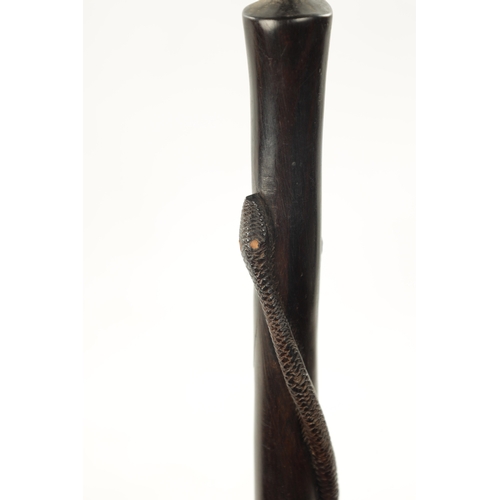 742 - A 19TH CENTURY AFRICAN HARDWOOD WALKING STICK with carved bust and snake, together with A 19TH CENTU... 