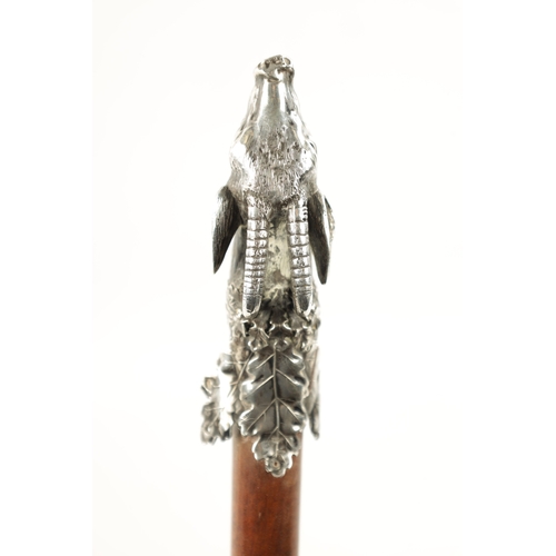 746 - AN EARLY 20TH CENTURY CONTINENTAL SILVER-HANDLED WALKING CANE modelled as a chamois head on hardwood... 