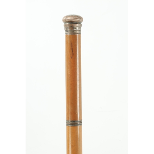 747 - AN EARLY 20TH CENTURY MALACCA CANE WALKING STICK FITTED WITH GLASS DECANTER the screwed top revealin... 