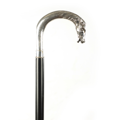 750 - AN EARLY 20TH CENTURY CONTINENTAL SILVER-HANDLED WALKING STICK the hallmarked handle modelled as a h... 