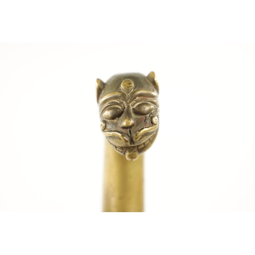 757 - A 19TH CENTURY EUROPEAN BRASS HANDLE SWORD STICK the handle modelled as a stylised lion's head on eb... 