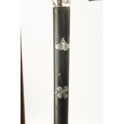 763 - OF GOLFING INTEREST, A COLLECTION OF THREE 19TH CENTURY SILVER TOPPED WALKING STICKS formed as golf ... 