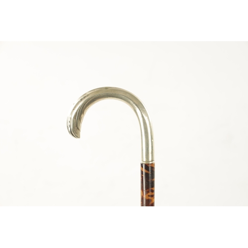 767 - A 19TH CENTURY TORTOISESHELL VENEERED AND SILVER TOPPED WALKING STICK with fluted hook (86cm long)