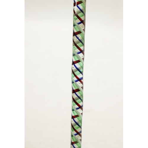 772 - A LATE 19TH CENTURY GLASS WALKING STICK with spiralled coloured glass decoration. (98cm long)