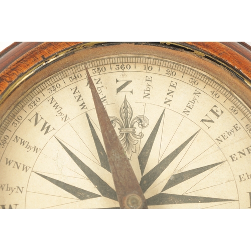 784 - AN OVERSIZED GEORGE III MAHOGANY COMPASS the printed calibrated paper dial and double sided steel po... 