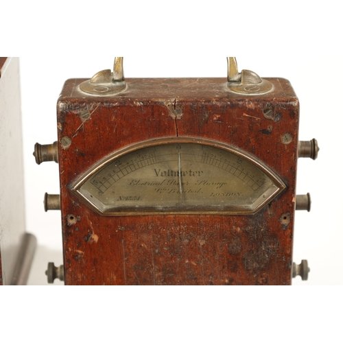 785 - A 19TH CENTURY MAHOGANY CASED SIGNED ELECTRIC VOLTMETER with engraved calibrated dial together with ... 