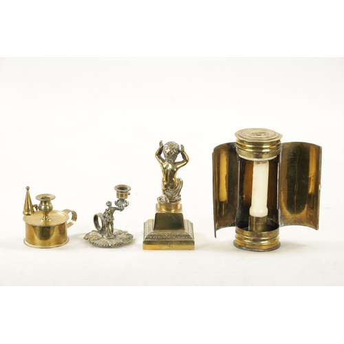 789 - FOUR PIECES OF 19TH CENTURY BRASSWARE including a miner's candle lamp, chamberlain candlestick, tape... 