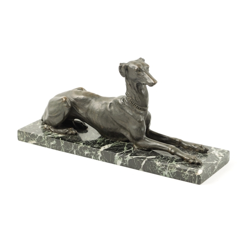 1001 - A 19TH CENTURY FRENCH PATINATED BRONZE SCULPTURE modelled as a recumbent greyhound dog mounted on an... 