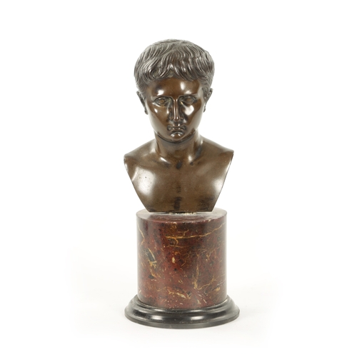 1005 - A 19TH CENTURY GRAND TOUR BRONZE BUST mounted on a veined marble socle base (24cm high )