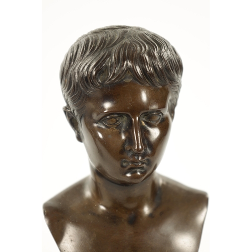 1005 - A 19TH CENTURY GRAND TOUR BRONZE BUST mounted on a veined marble socle base (24cm high )