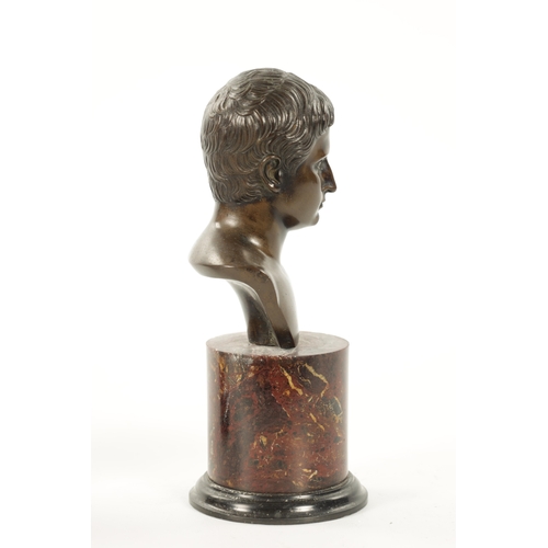 1005 - A 19TH CENTURY GRAND TOUR BRONZE BUST mounted on a veined marble socle base (24cm high )