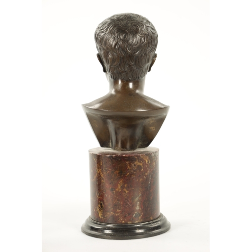 1005 - A 19TH CENTURY GRAND TOUR BRONZE BUST mounted on a veined marble socle base (24cm high )