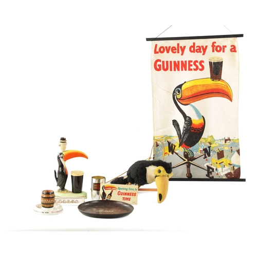 1009 - A CARLTON GUINNESS ADVERTISING TABLE LAMP, A GUINNESS ASHTRAY AND VARIOUS OTHER RELATED ITEMS (the l... 