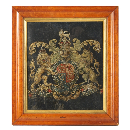 1011 - A 19TH CENTURY CRESTED LEATHER PANEL depicting a Royal Coat of Arms - glazed maple frame with gilt s... 