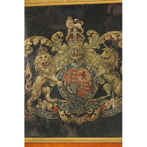 1011 - A 19TH CENTURY CRESTED LEATHER PANEL depicting a Royal Coat of Arms - glazed maple frame with gilt s... 