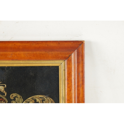 1011 - A 19TH CENTURY CRESTED LEATHER PANEL depicting a Royal Coat of Arms - glazed maple frame with gilt s... 