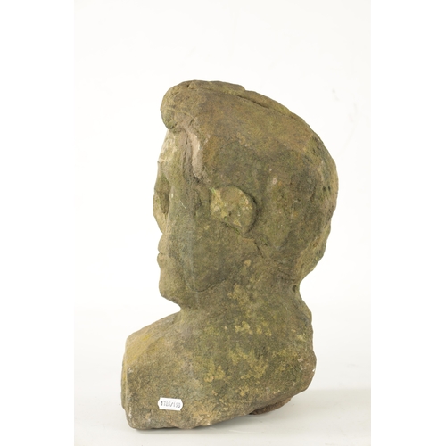 1013 - AN EARLY CARVED STONE BUST of a young man (35cm high )